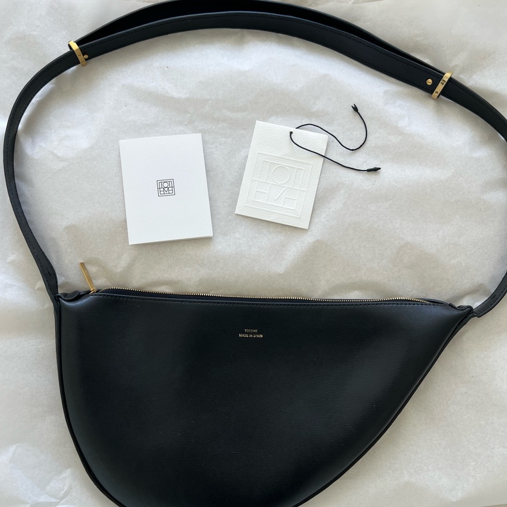 TOTEME Leather scooped sling black with gold hardware